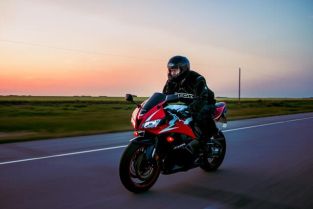 man riding motorcycle