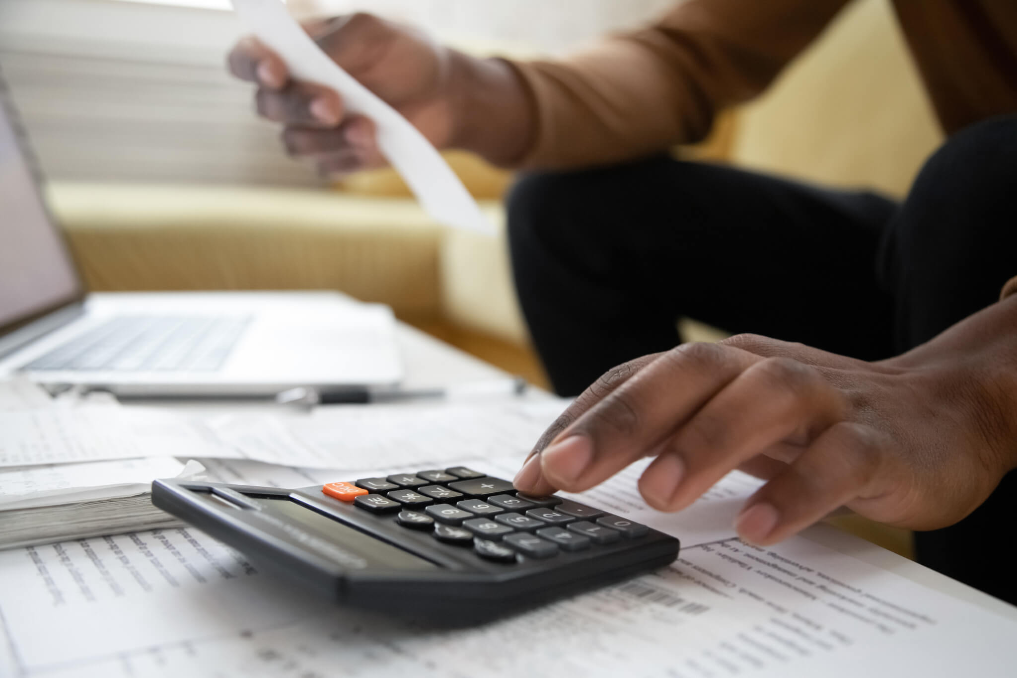 Close up of african american man with calculator