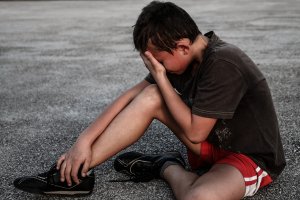 boy crying after accident