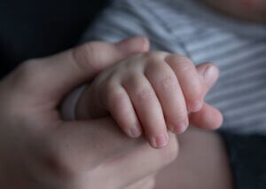 baby hand in mothers hand