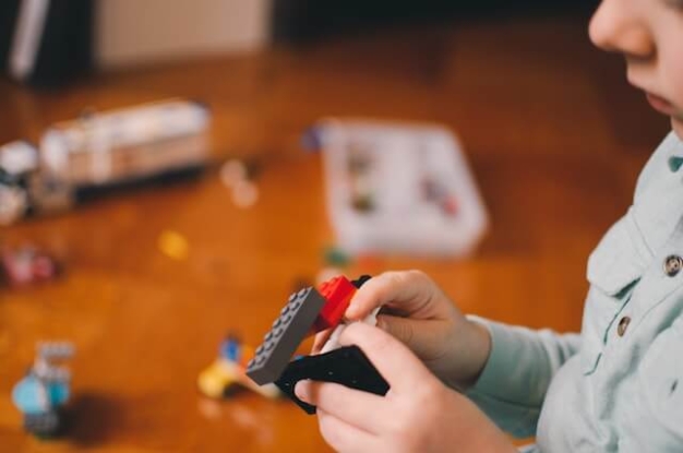 child playing lego