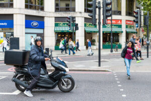 pedestrian and motorcycle